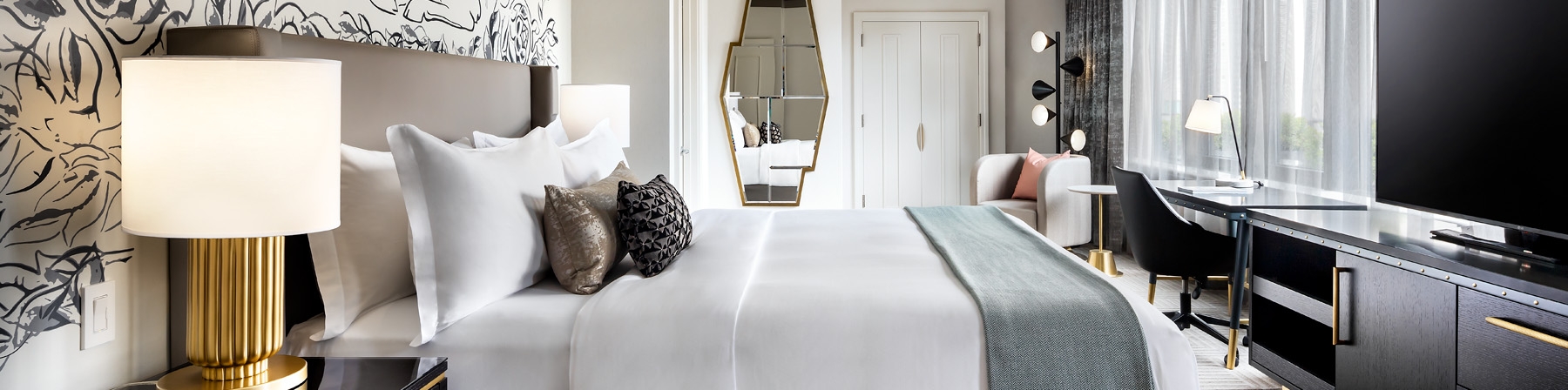 The large bedroom and bed in the Gwen Lux suite, which also included a work station and large HD TV.