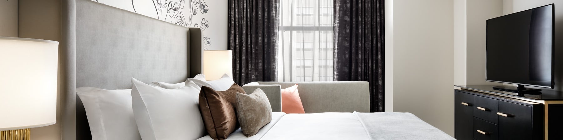 Side view of room with a Queen bed