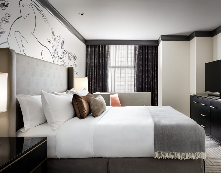 Side view of room with a Queen bed