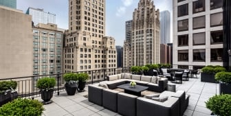 The rooftop terrace and outdoor seating of The Gwen in downtown Chicago.