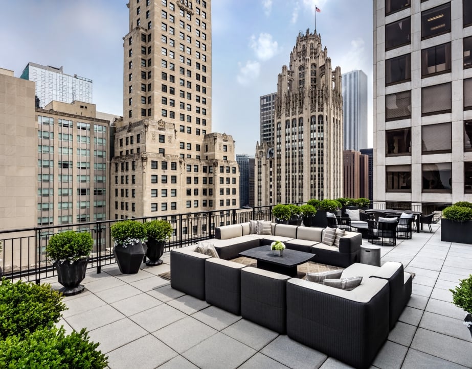The rooftop terrace and outdoor seating of The Gwen in downtown Chicago.