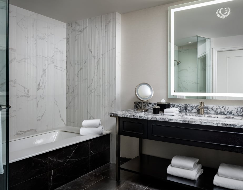 The Gwen Lux suite bathroom vanity and marble countertop.