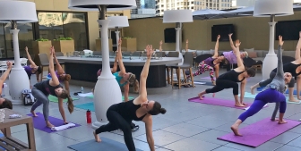 A yoga class at Upstairs at The Gwen